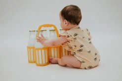 Sproet & Sprout | Pointelle Ruffle Romper | Sunshine Peach